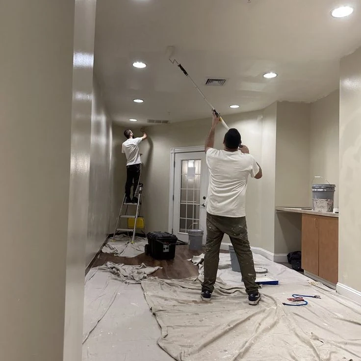 Professional painter working on Massachusetts home